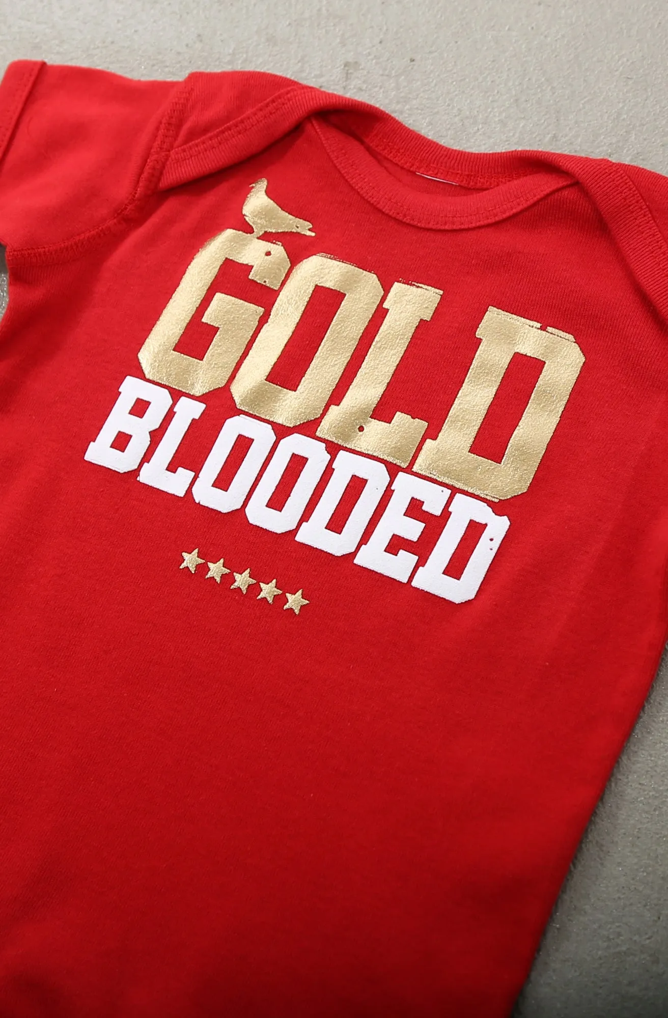 Gold Blooded (Baby Red Onesie)